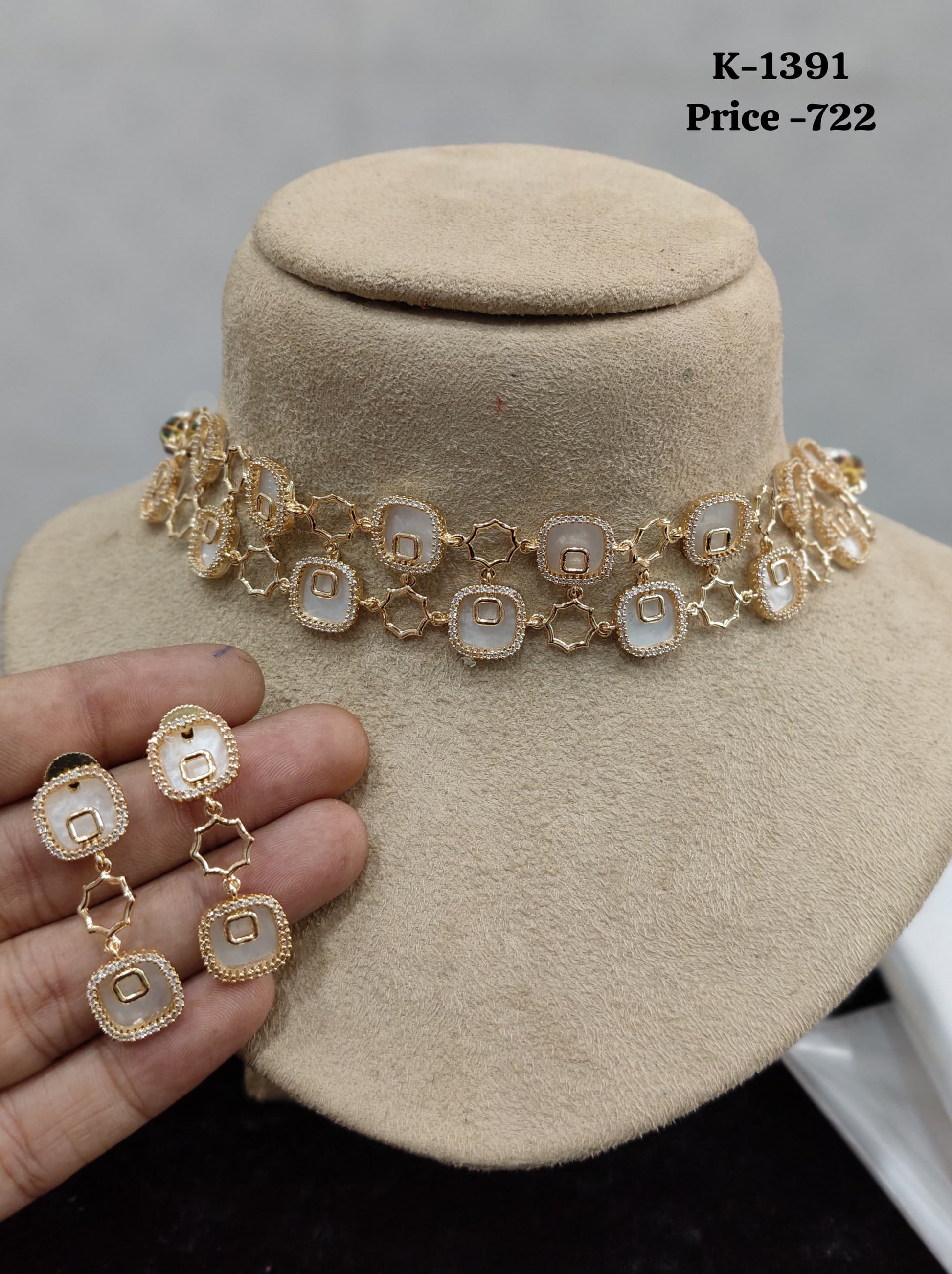 Gold geometric choker necklace set with white stone panels and matching drop earrings by Purki Jewels